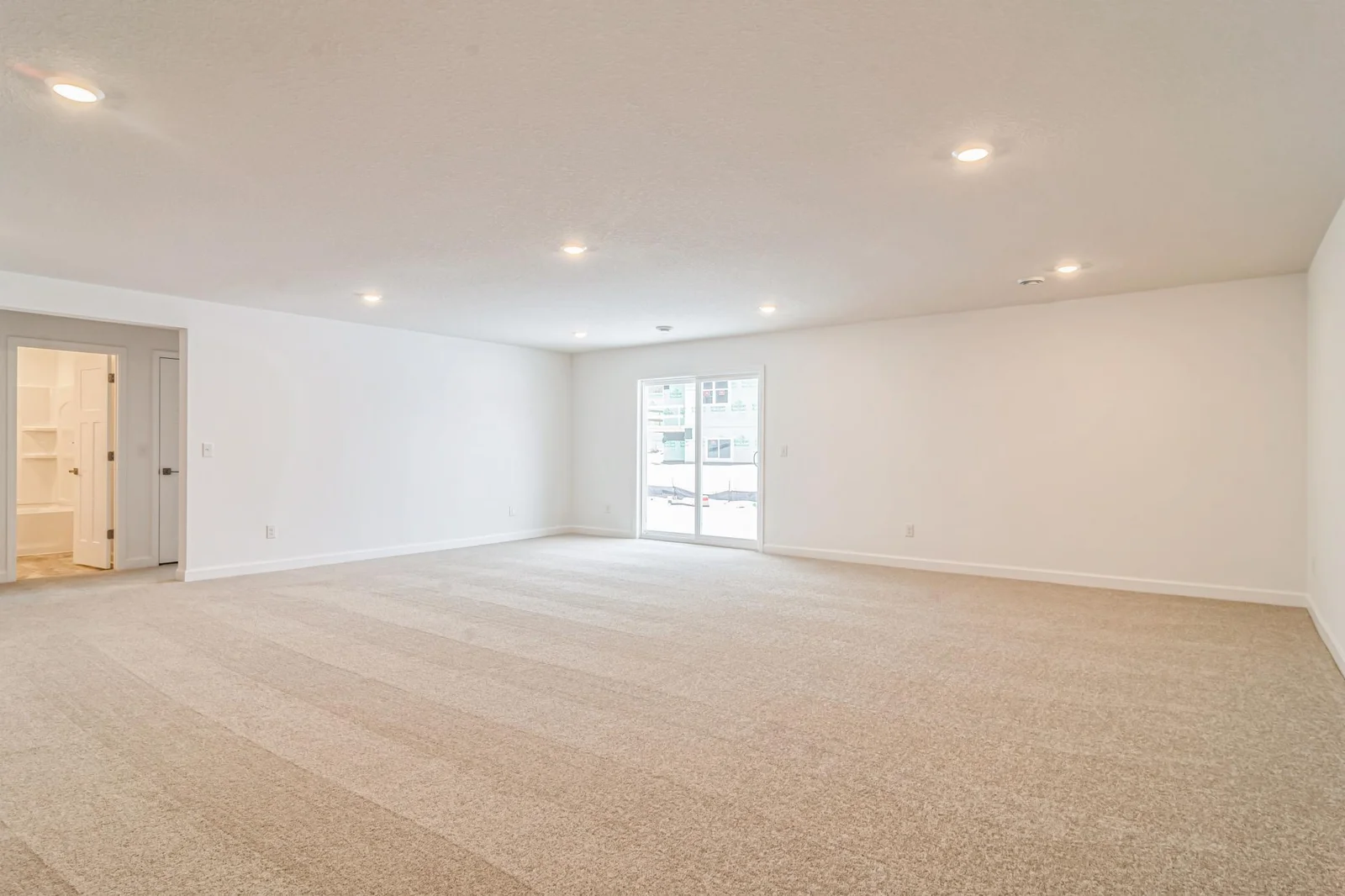 (Photo of similar home, features will vary) The finished basement.