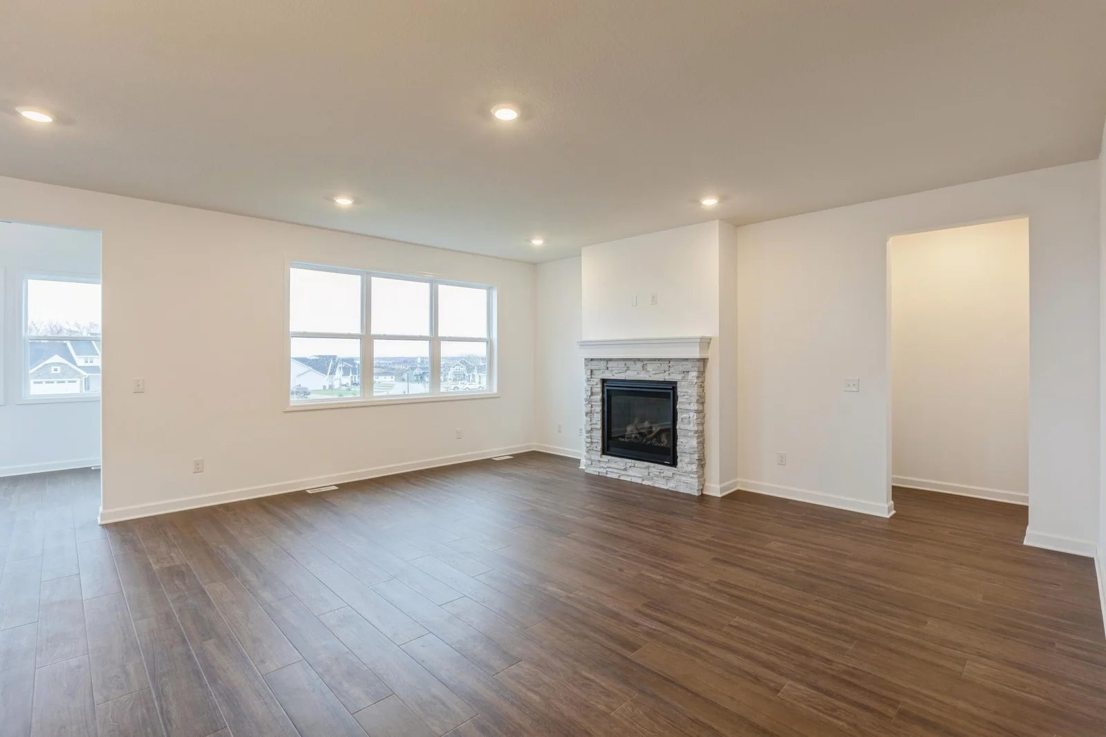 (Photo of similar home, features will vary) The Great Room is excellent for hosting movie nights, relaxing and making cherished memories with loved ones. It’s shown here with an optional fireplace to add a warm touch.