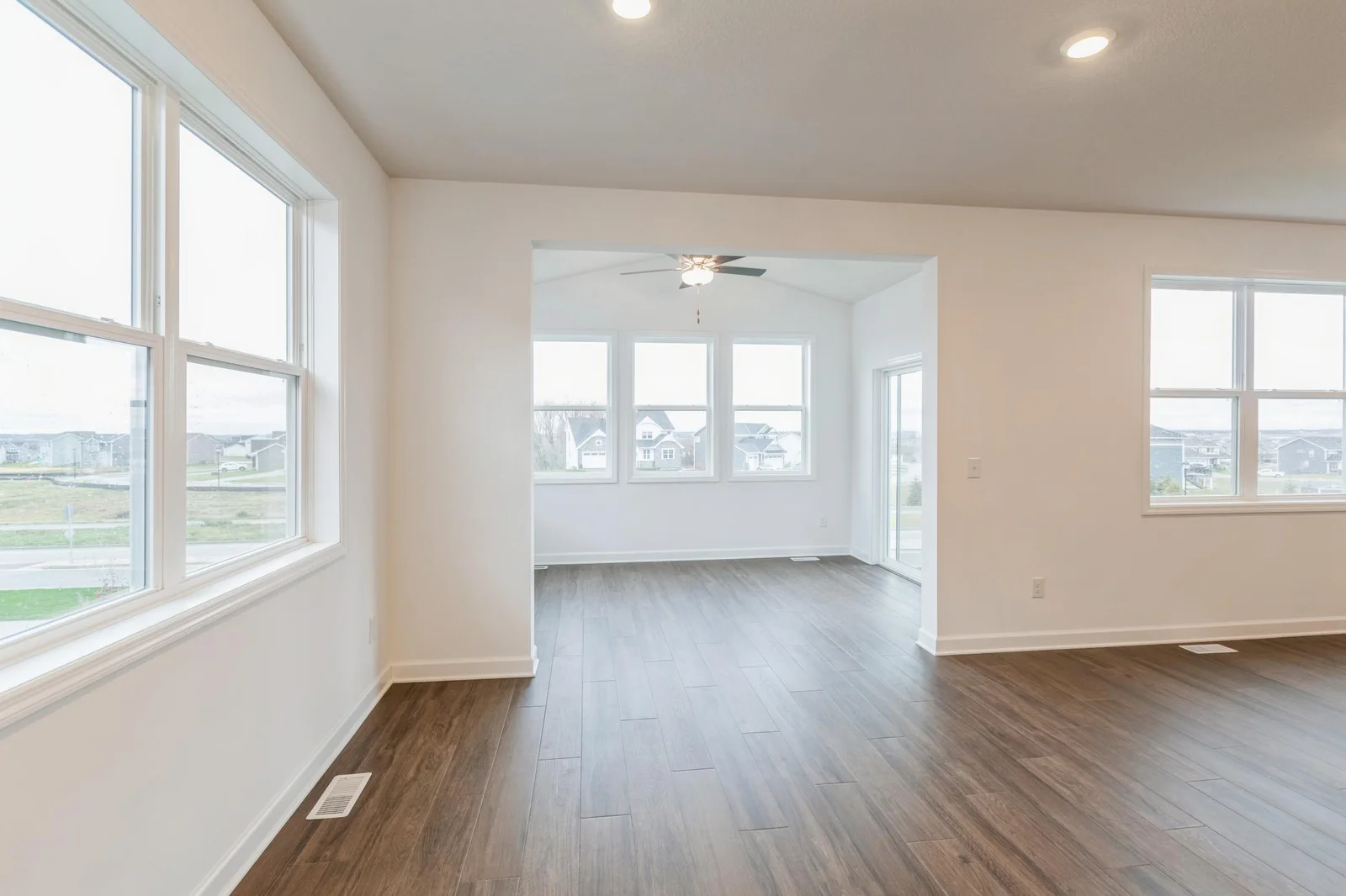(Photo of similar home, features will vary) This single-level home features a generous open-concept design where the kitchen, dining room and Great Room share a space!