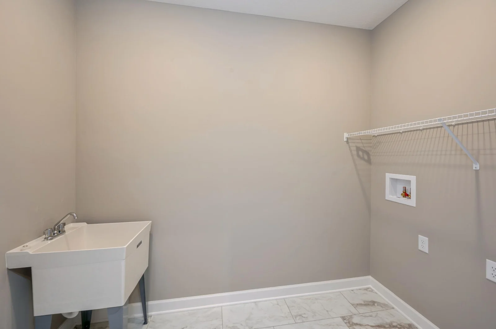 (Photo of similar home, features will vary) Main level laundry!
