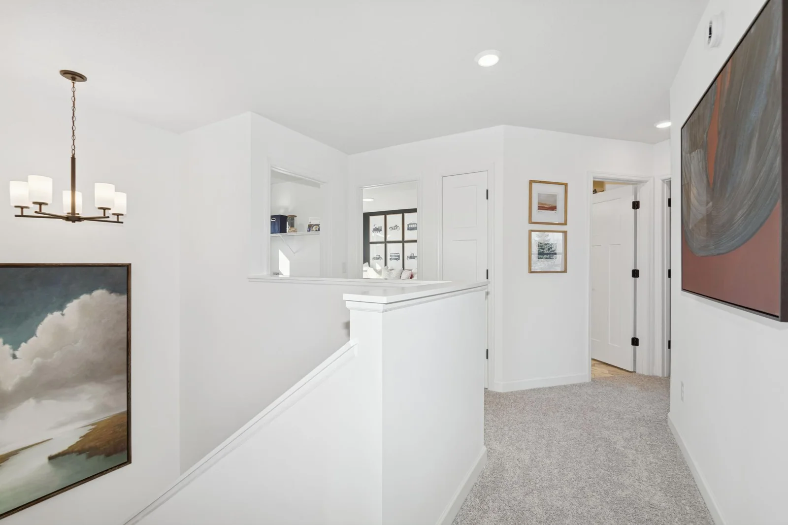 (Photo of a decorated model, actual homes finishes will vary) The upper level landing!