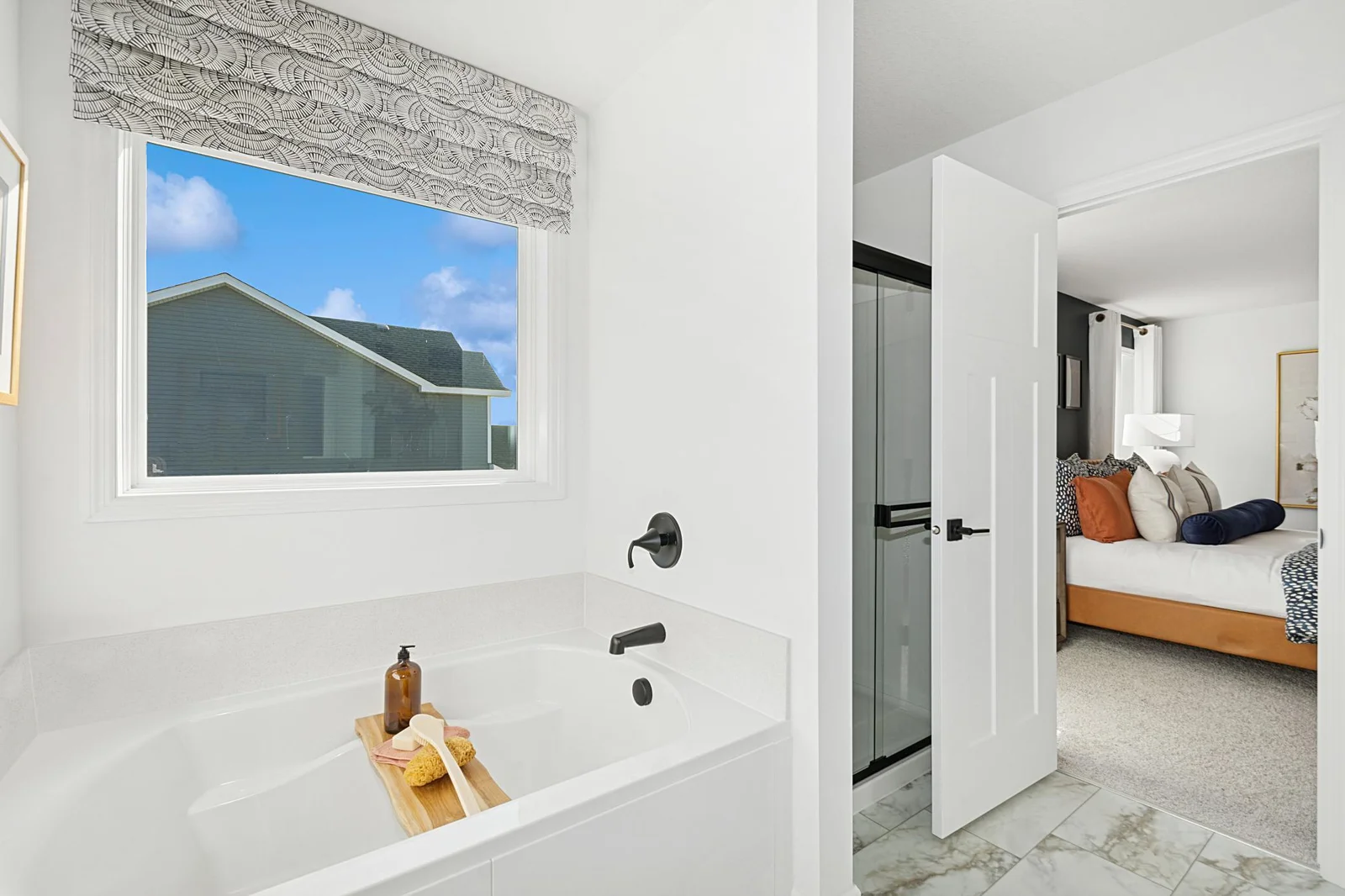 (Photo of a decorated model, actual homes finishes will vary) Another view of the primary bath.
