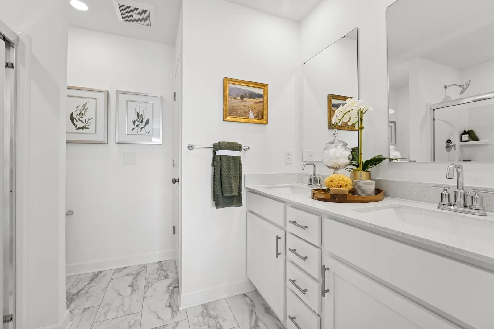 (Photo of a decorated model. Features and finishes will vary) The Owner's bath, attached to the bedroom!