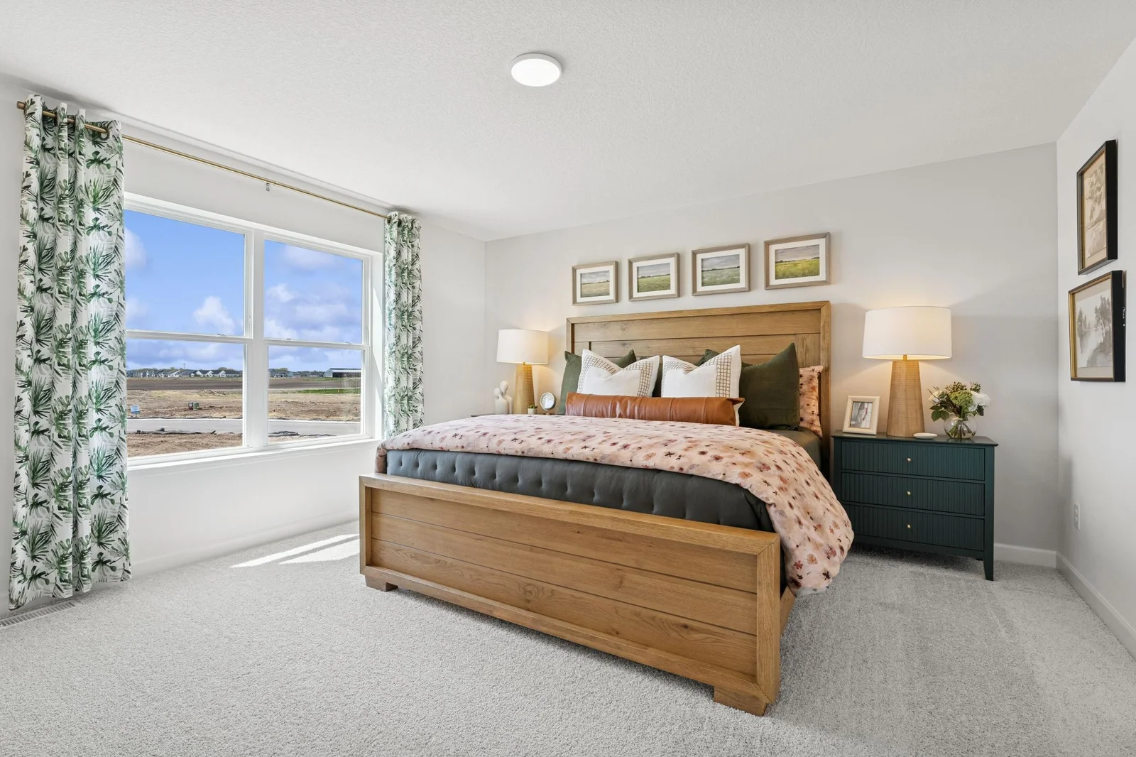 (Photo of a decorated model. Features and finishes will vary) The Owner's bedroom!