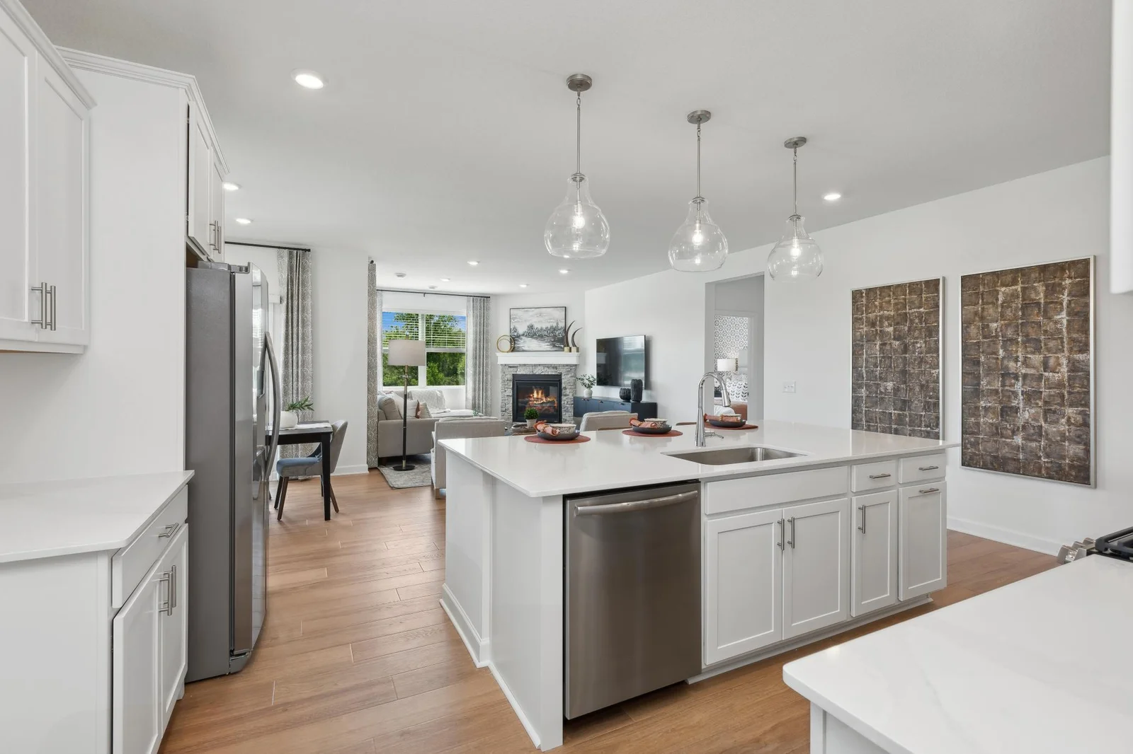 *Photo of model home, actual features may vary. The main level seamlessly transitions from room to room while maintaining an open-concept layout throughout.