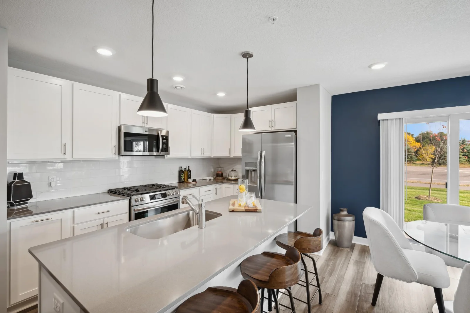 (Photo of a decorated model, actual homes finishes will vary) Stunning kitchen island!