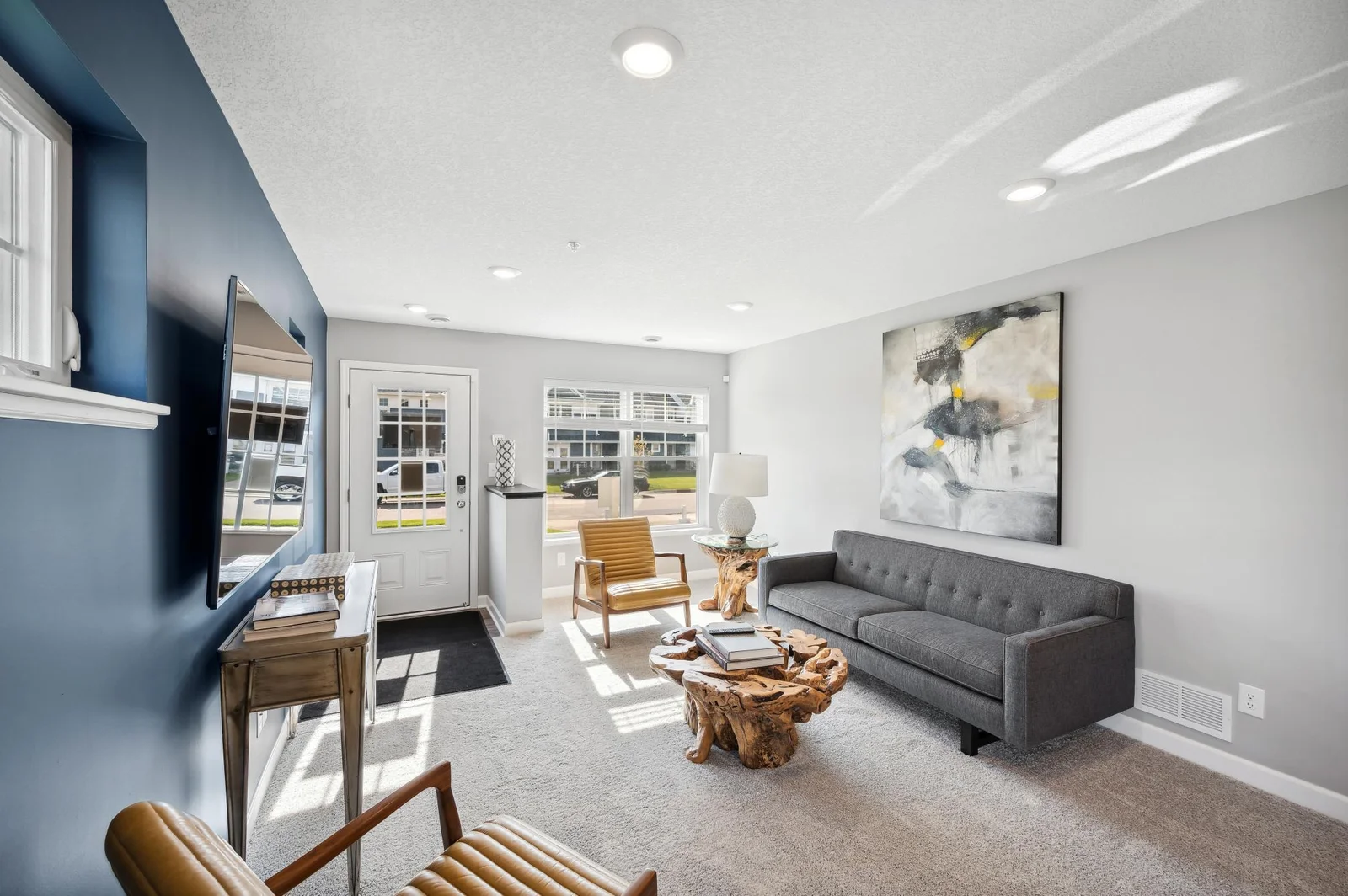 (Photo of decorated model, actual home's finishes vary) Notice the stunning natural light pouring into the family room.
