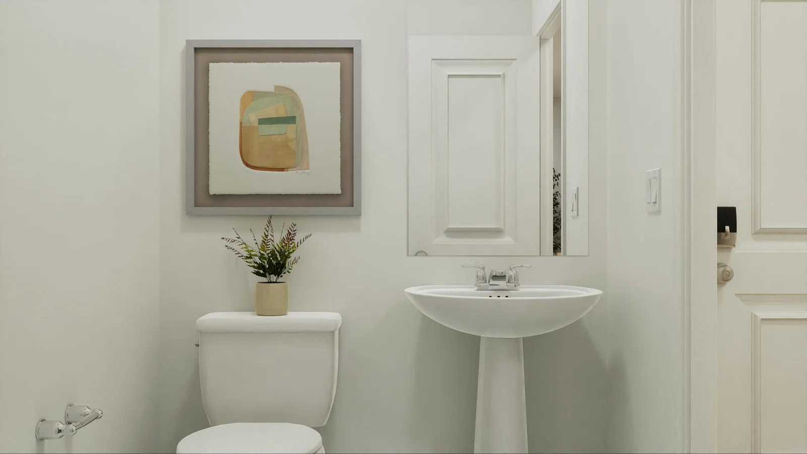 (Photo is of a virtual rendering, actual finishes will vary) The powder room features a pedestal sink on the first floor, easily accessible to both guests and residents.