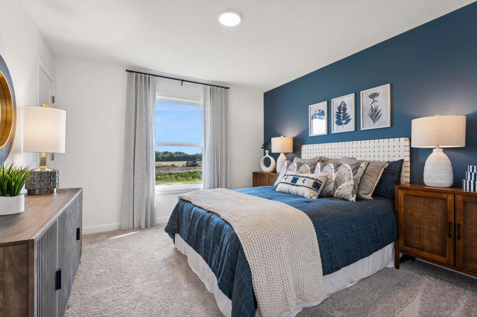 (Photos of model home, features will vary) The home has four bedrooms and is perfect for a growing family or someone simply looking for more space.