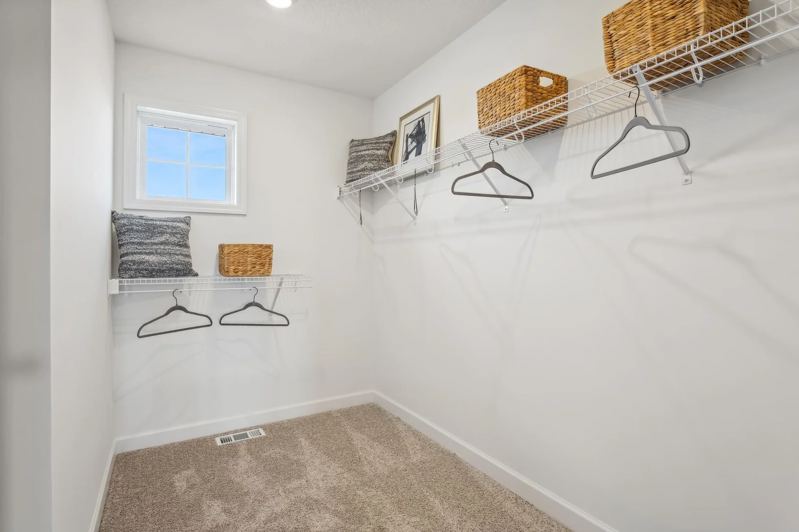 (Photos of model home, features will vary) The walk-in closet offers ample space and storage