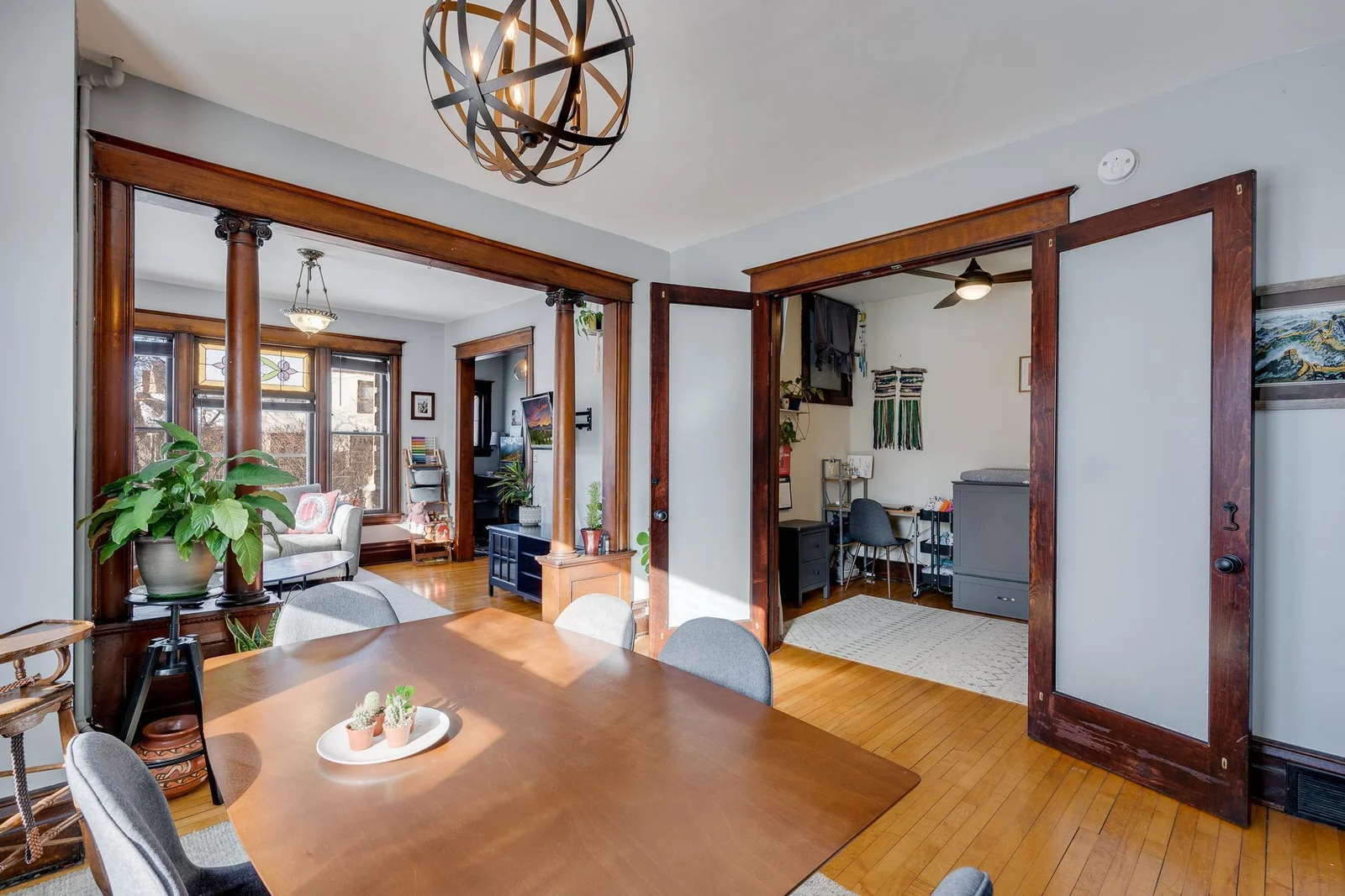 The first bedroom is behind the french doors