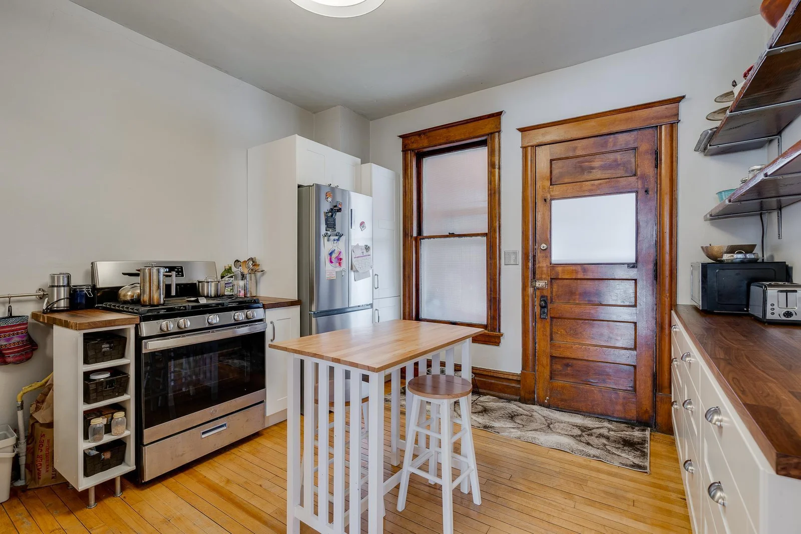 Newer cabinets w/ all white appliances throughout currently