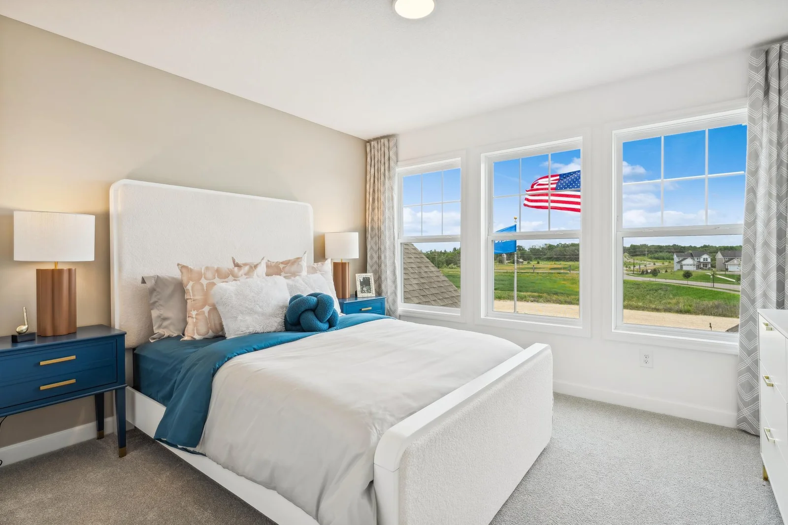(Photo of a decorated model, actual homes finishes will vary) Another secondary bedroom.