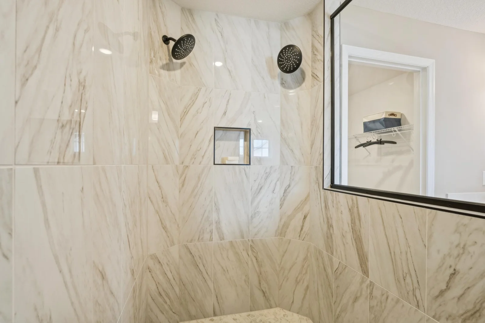(Photo of a decorated model, actual homes finishes will vary) An up close look at the serenity shower.