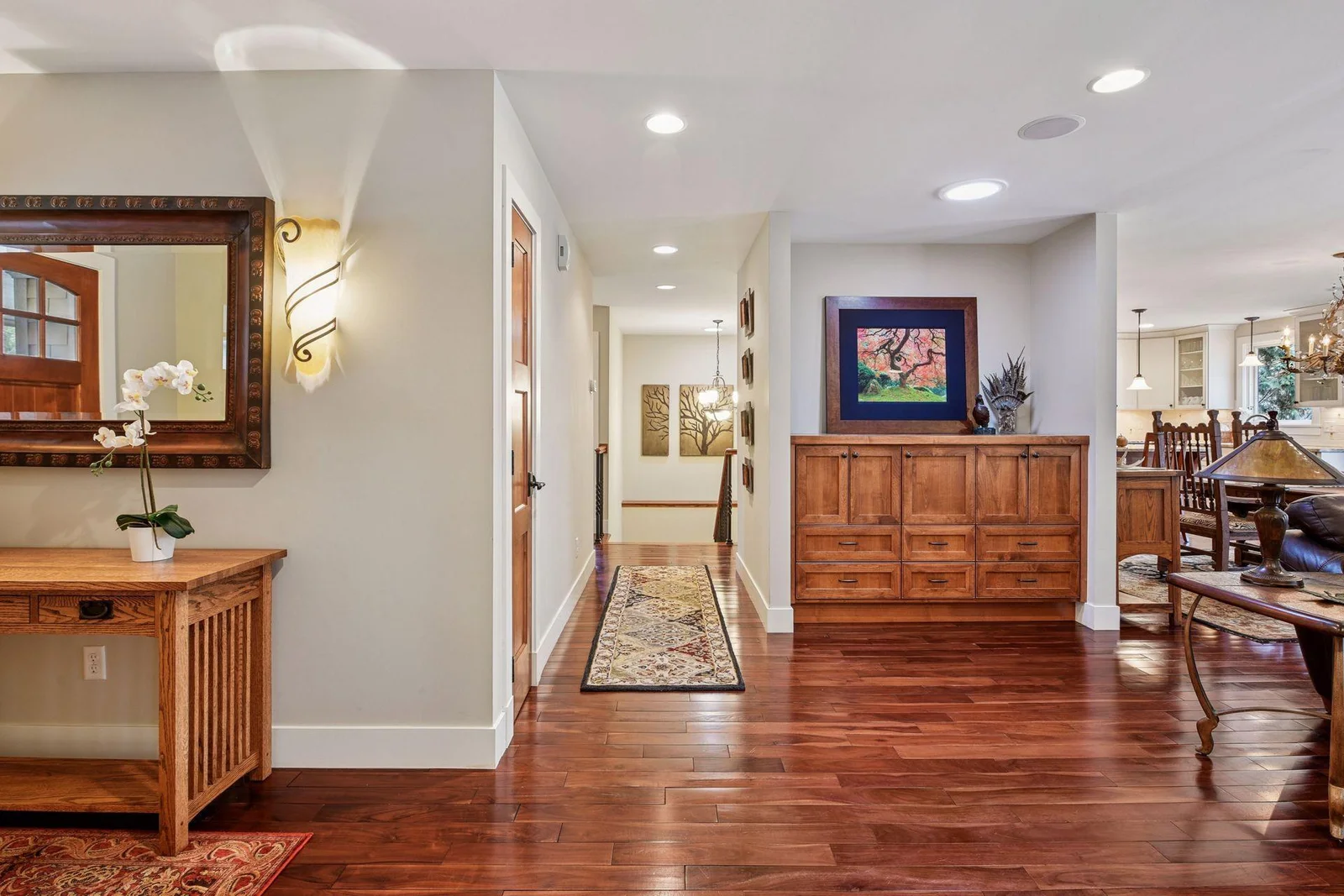 Gleaming cherry hardwood floors and craftsman style built-ins welcome you at 220 Glenbrook Rd. N.
