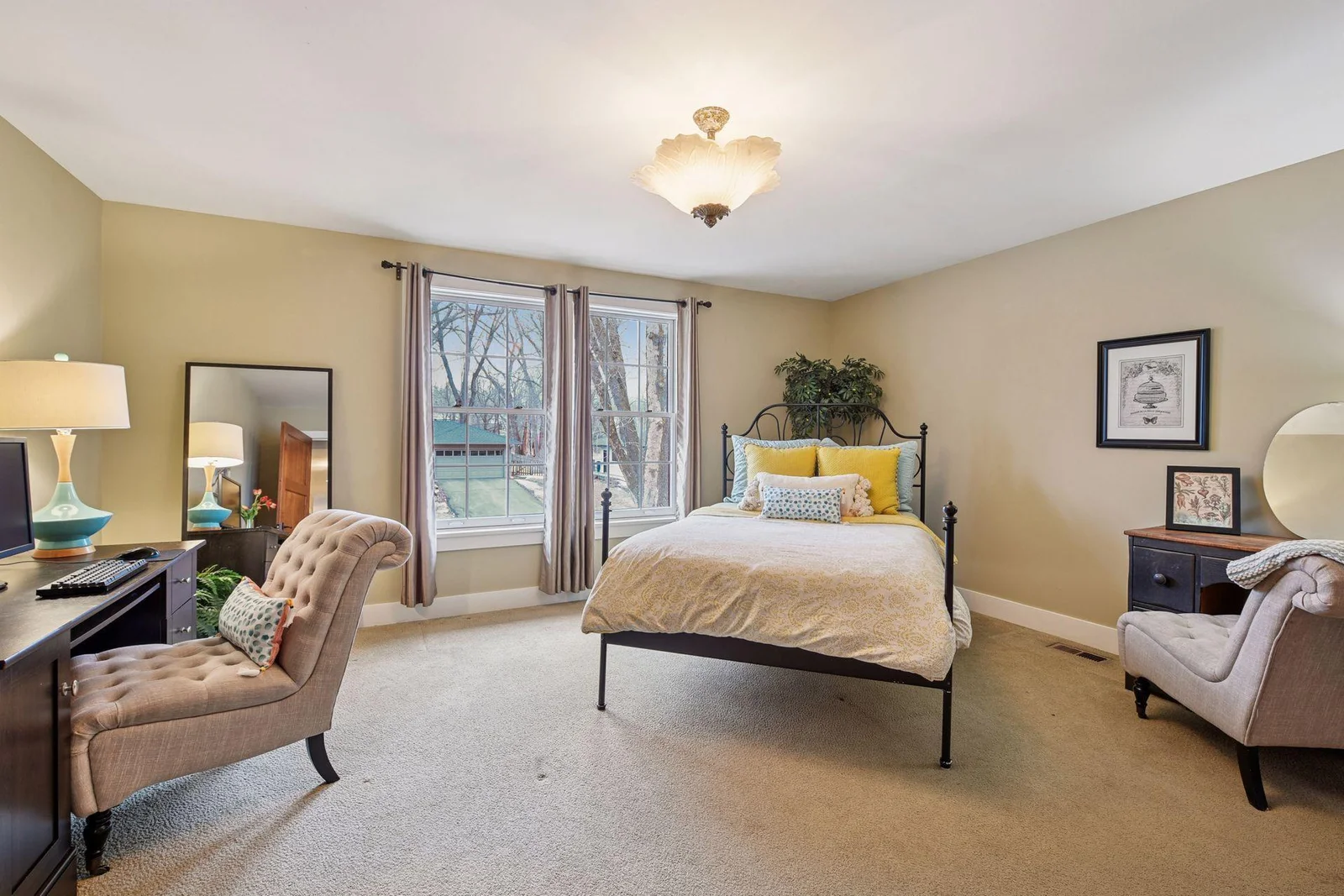 The second main level bedroom is large and has two, yes two, closets. And new carpet in here, too.