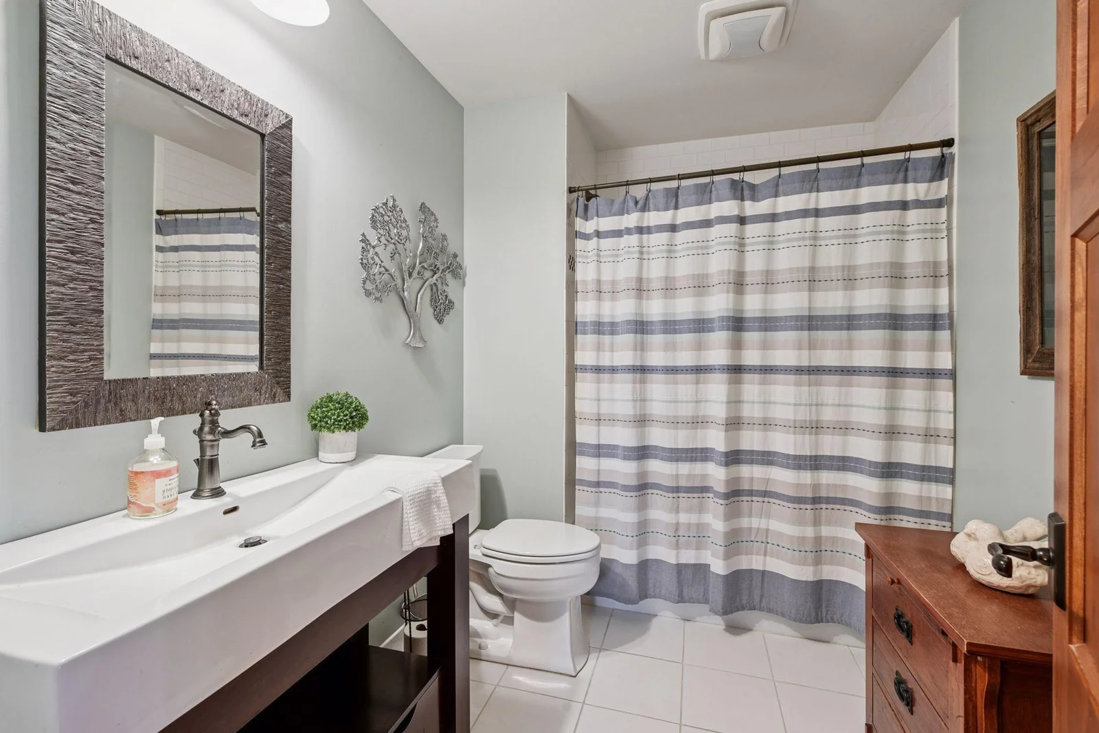 The second full bathroom, also on the main level, is just across from the laundry room.