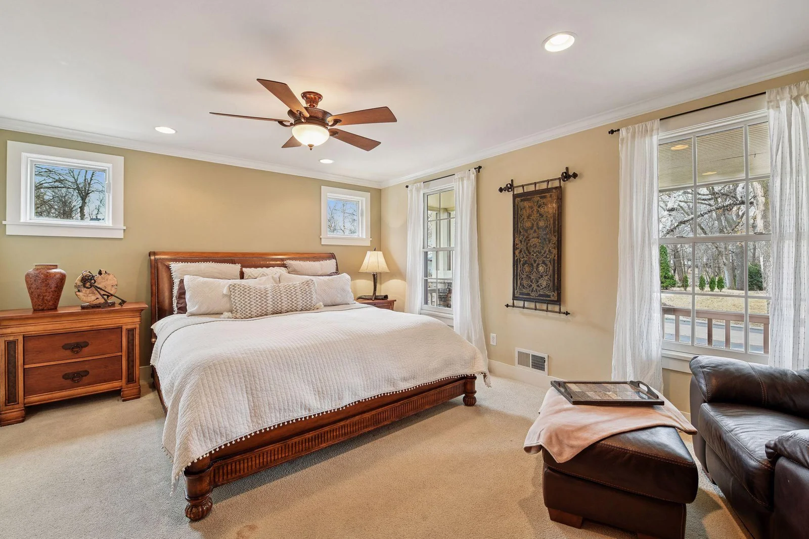 The primary bedroom is spacious and light has brand new carpet!