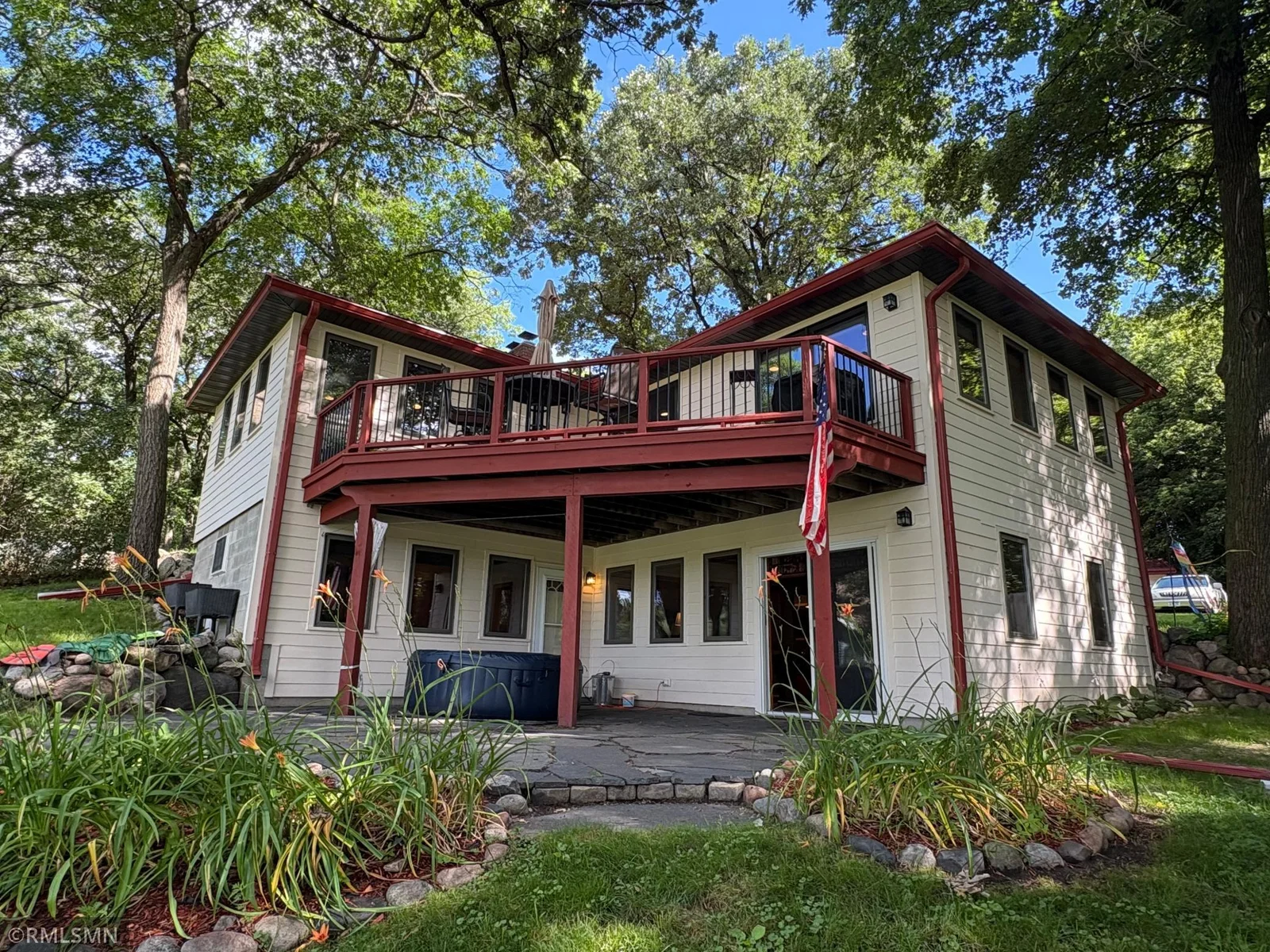 The home is set on the lakefront lot and features a spacious, open interior with generous room sizes—ideal for both everyday living and entertaining.