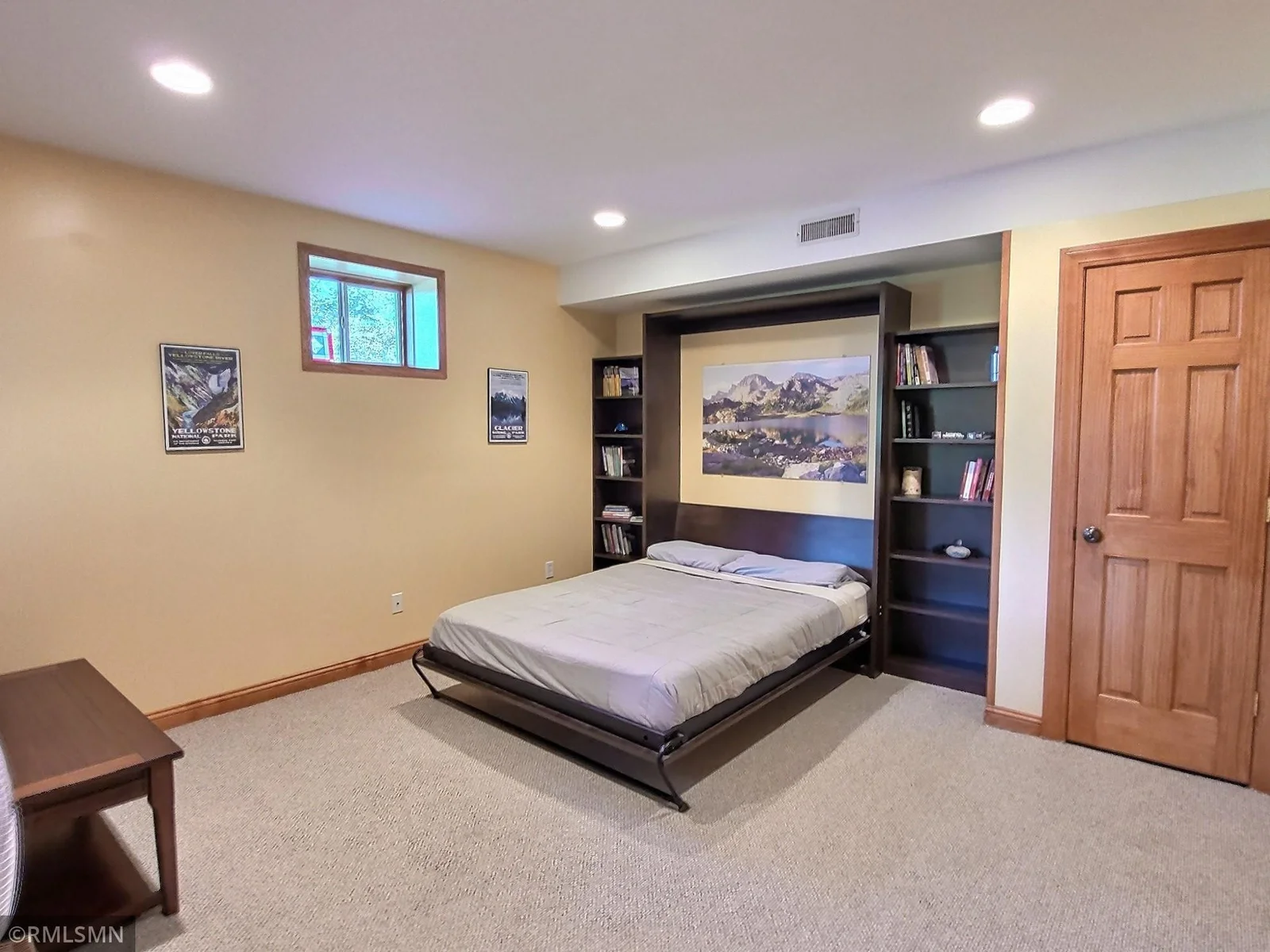The lower level bedroom has direct patio access and a Murphy bed, offering the flexibility to convert the space as needed.