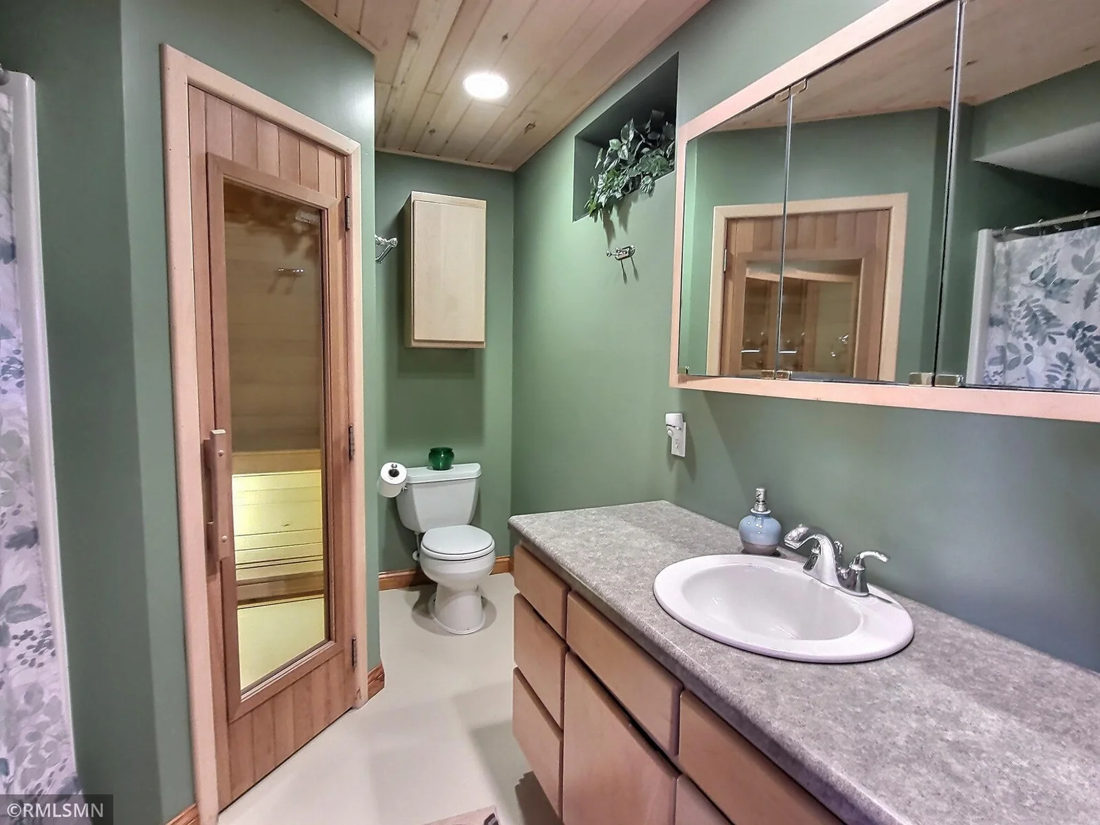 The lower level bath also features a sauna in the bath—an added touch of relaxation after a long day.