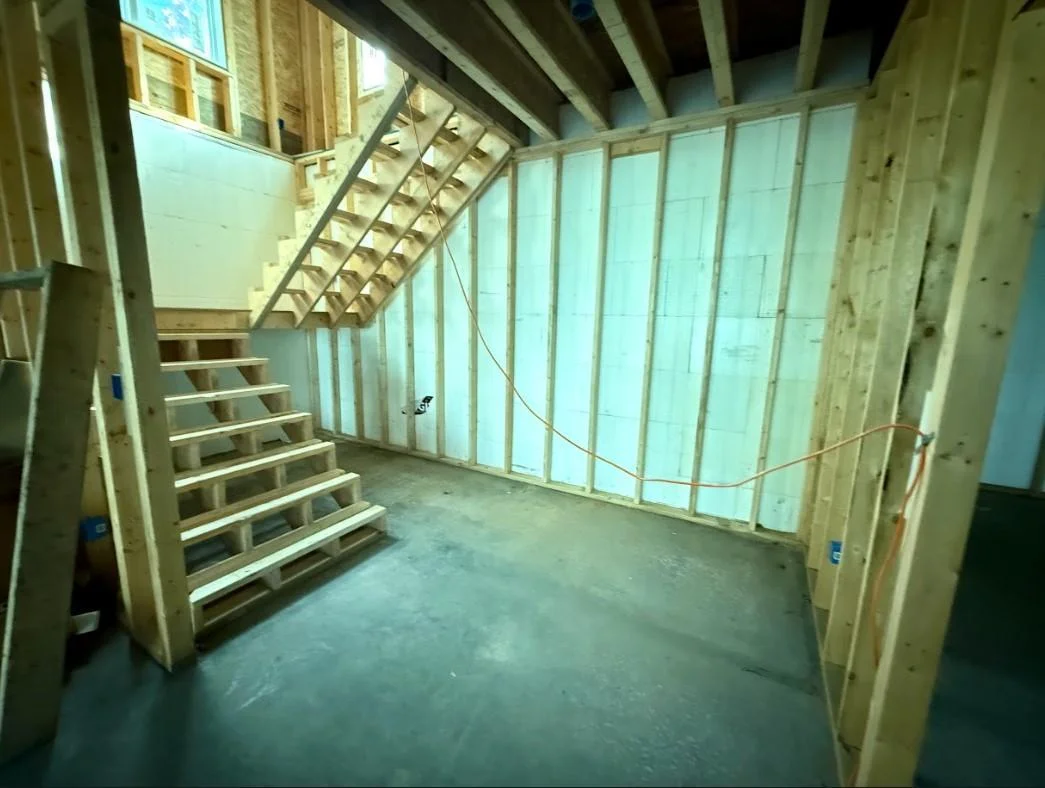 Wine cellar under stairway