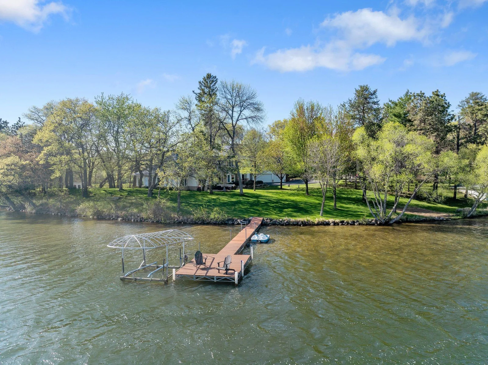 Boat lift and dock with chairs are included!