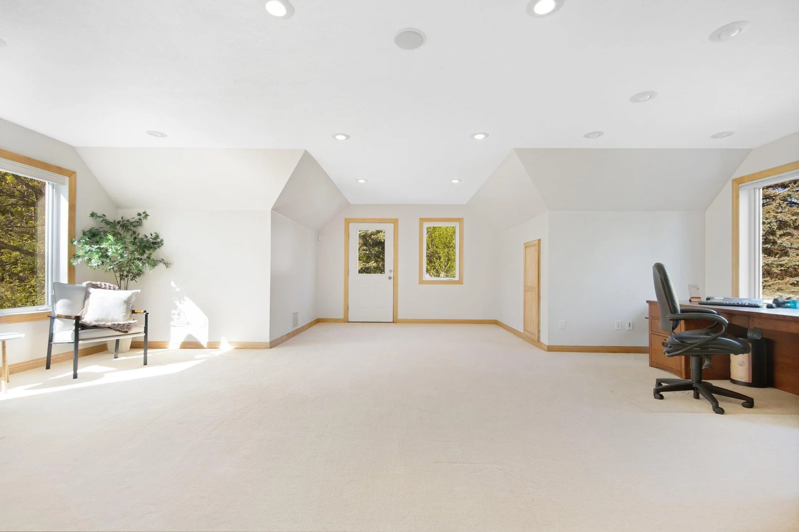 Upstairs features another oversized multipurpose space above the garage. This bonus room also has a separate entrance making it the perfect "generational living suite" or home office.
