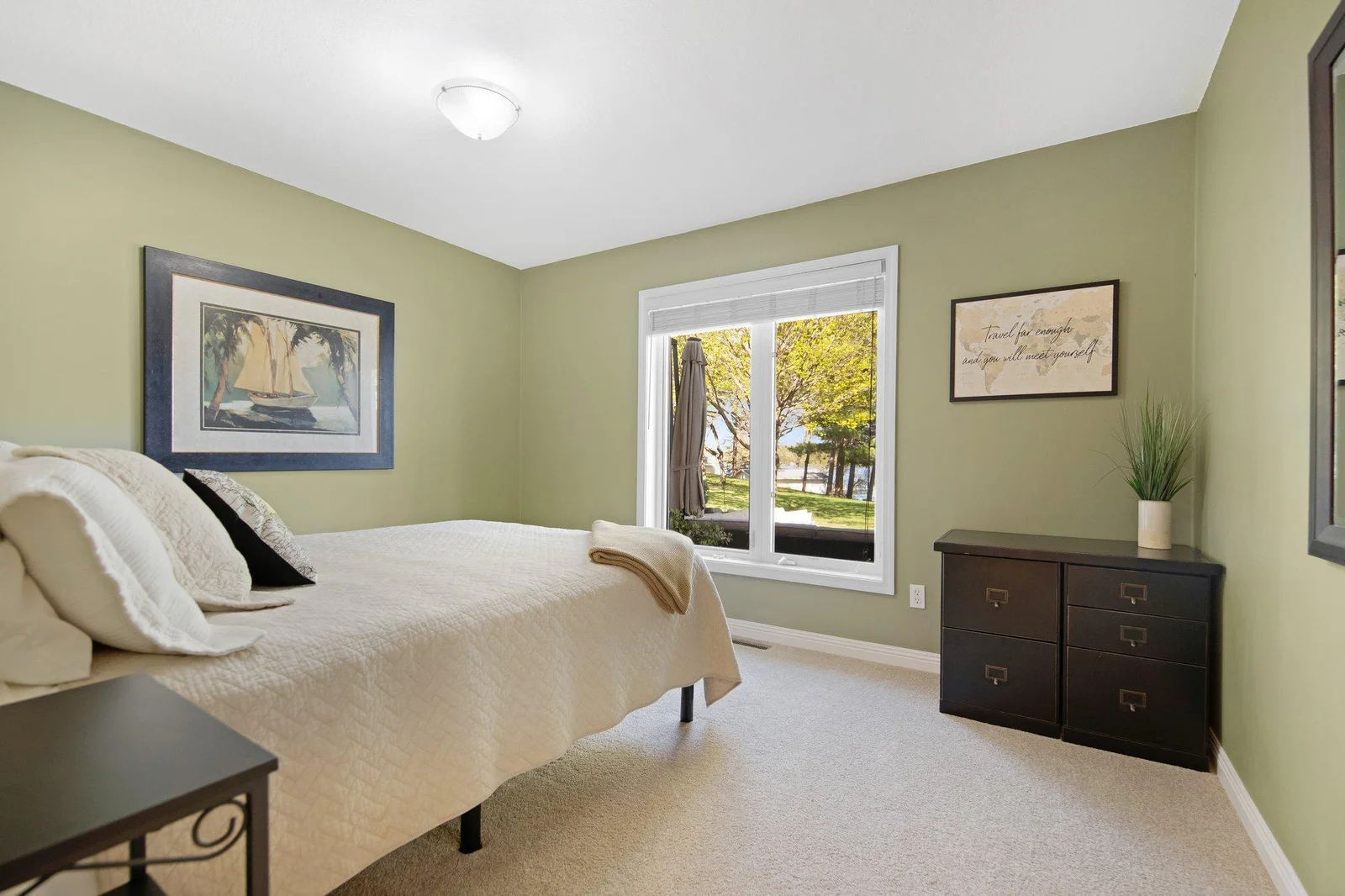 Additional 2nd main floor bedroom, perfect for guests. (This bedroom does not have a closet but could easily be added)