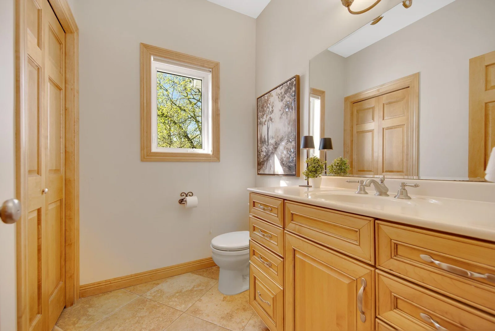 Main floor 1/2 bath also situated off of the garage and mudroom.