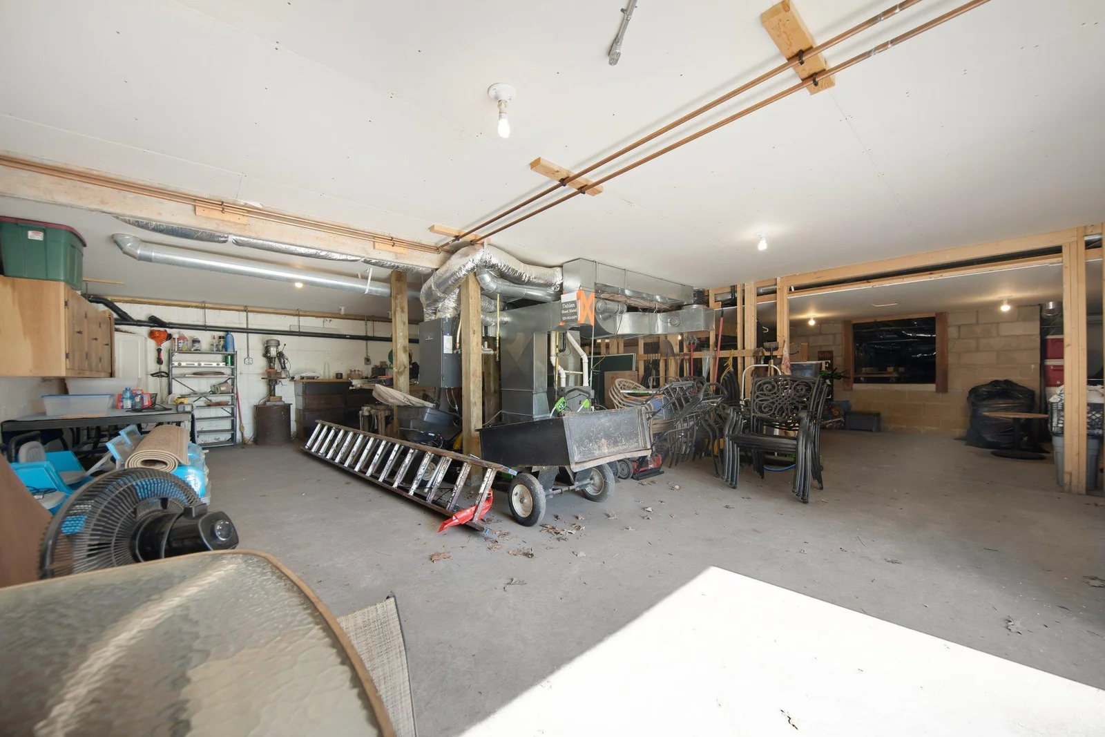 Mechanicals are neatly tucked away down here, along with ample storage and workshop space.
