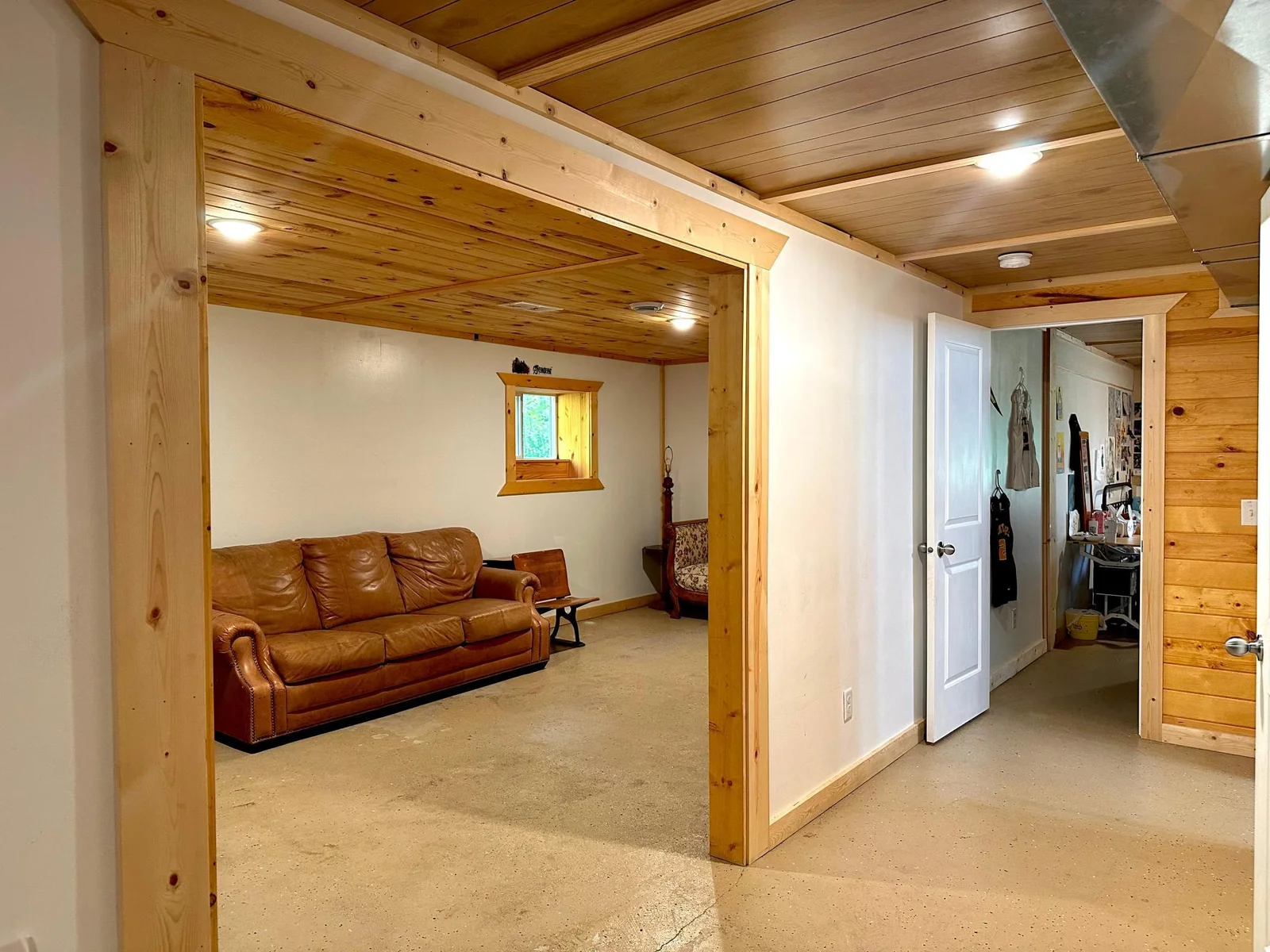 Bedroom ahead of me, bathroom and utility room to the right.