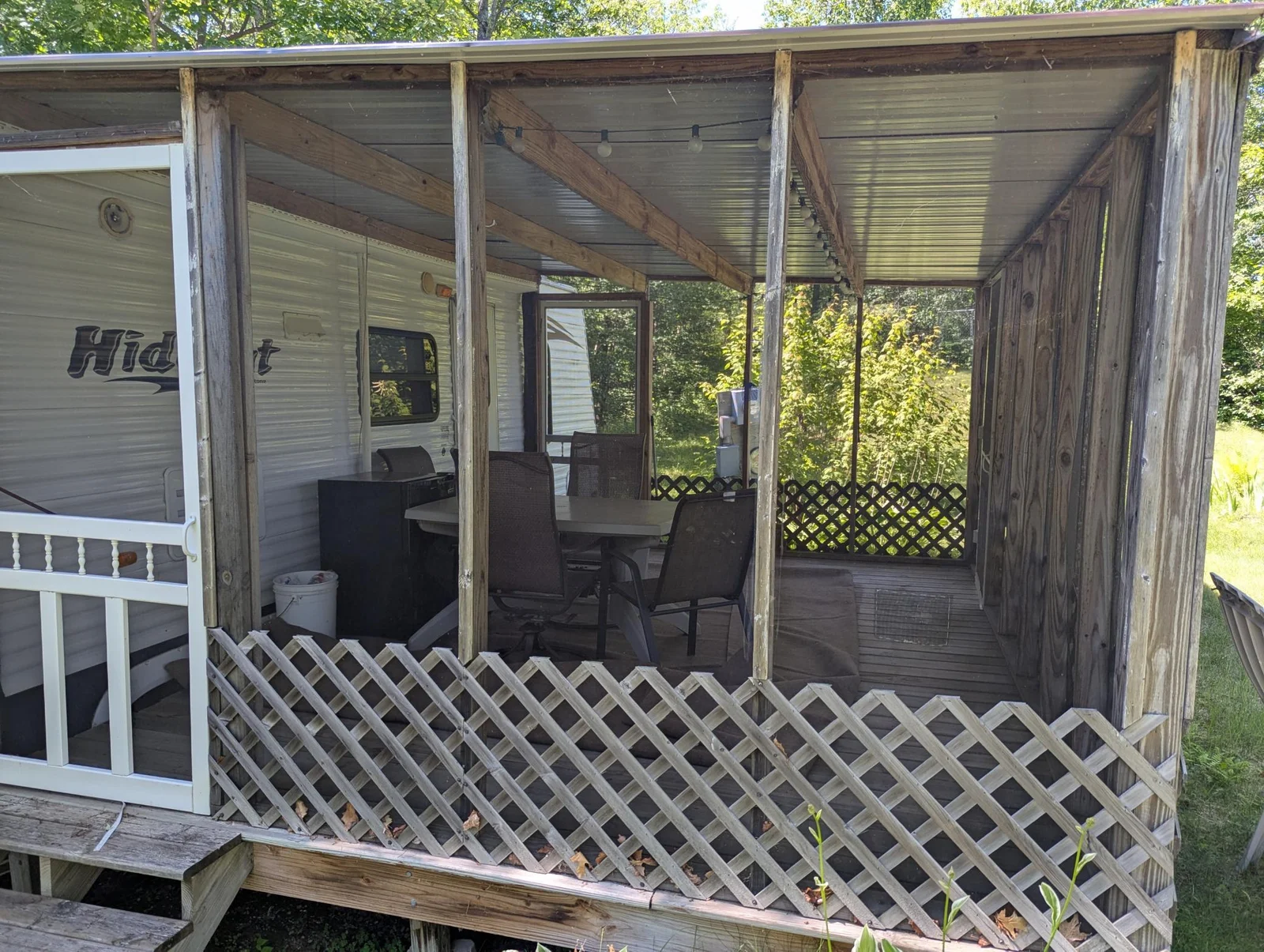 Screened in porch with camper