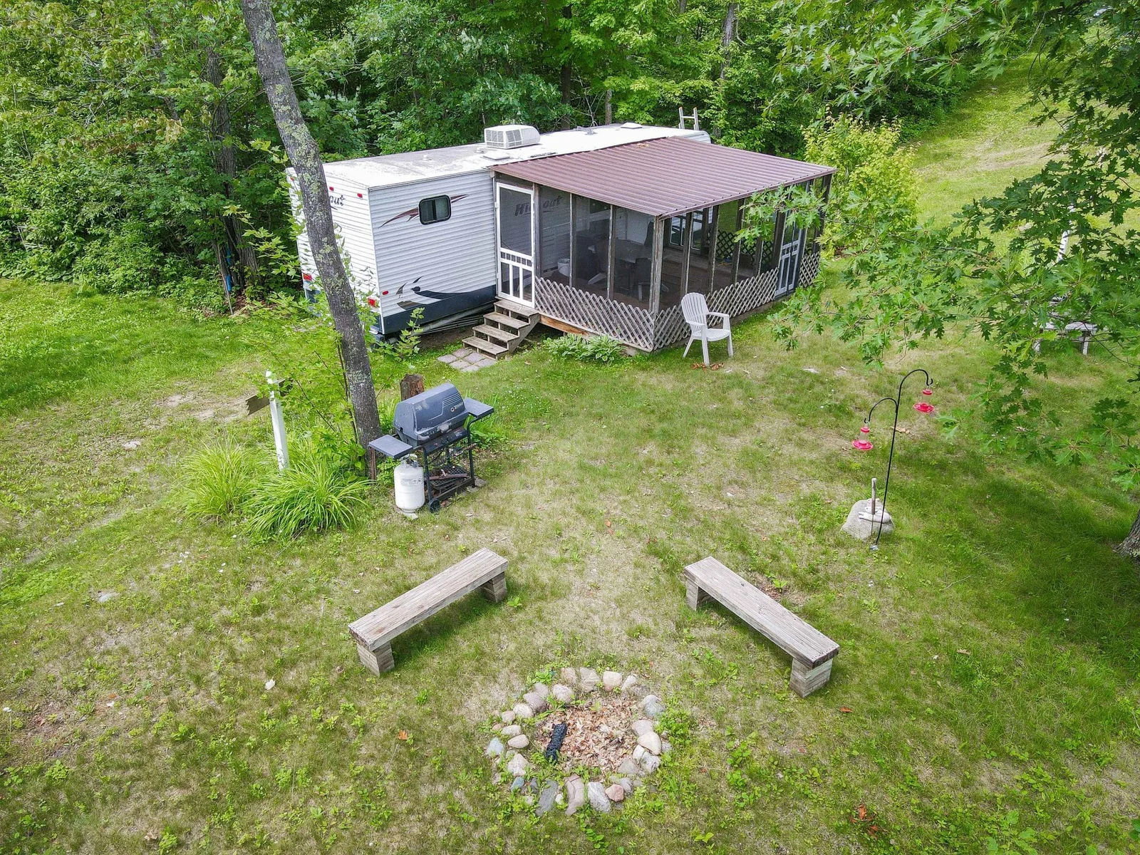 11 Camper with screen porch and fire pit.jpg