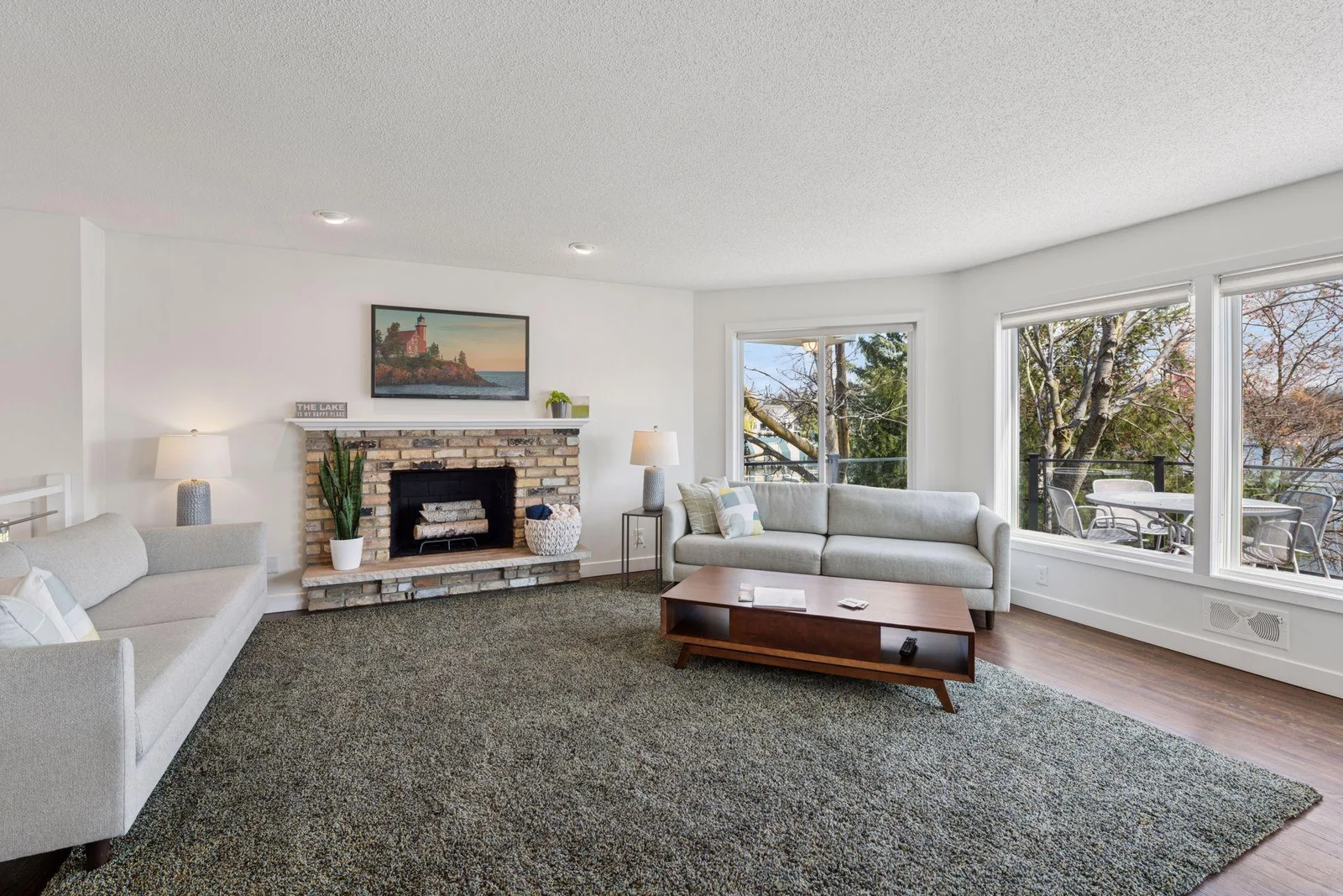 Step into this living room with incredible views of Lake Minnetonka