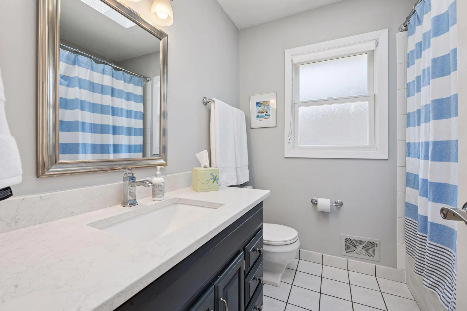 Updated full bath on the upper level