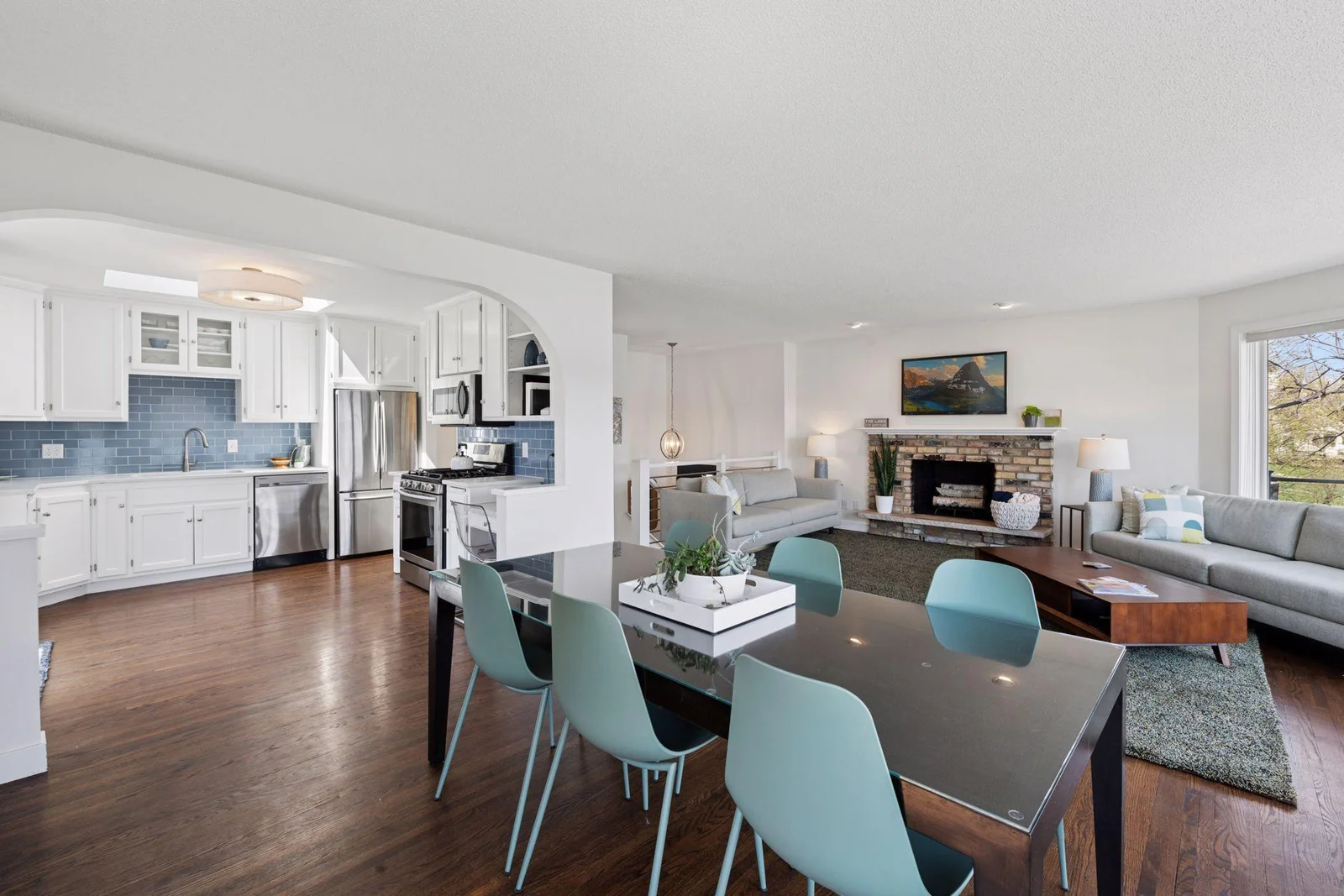 Enjoy seamless hosting in this inviting informal dining room, perfectly connected to the kitchen for effortless meal service and gatherings.