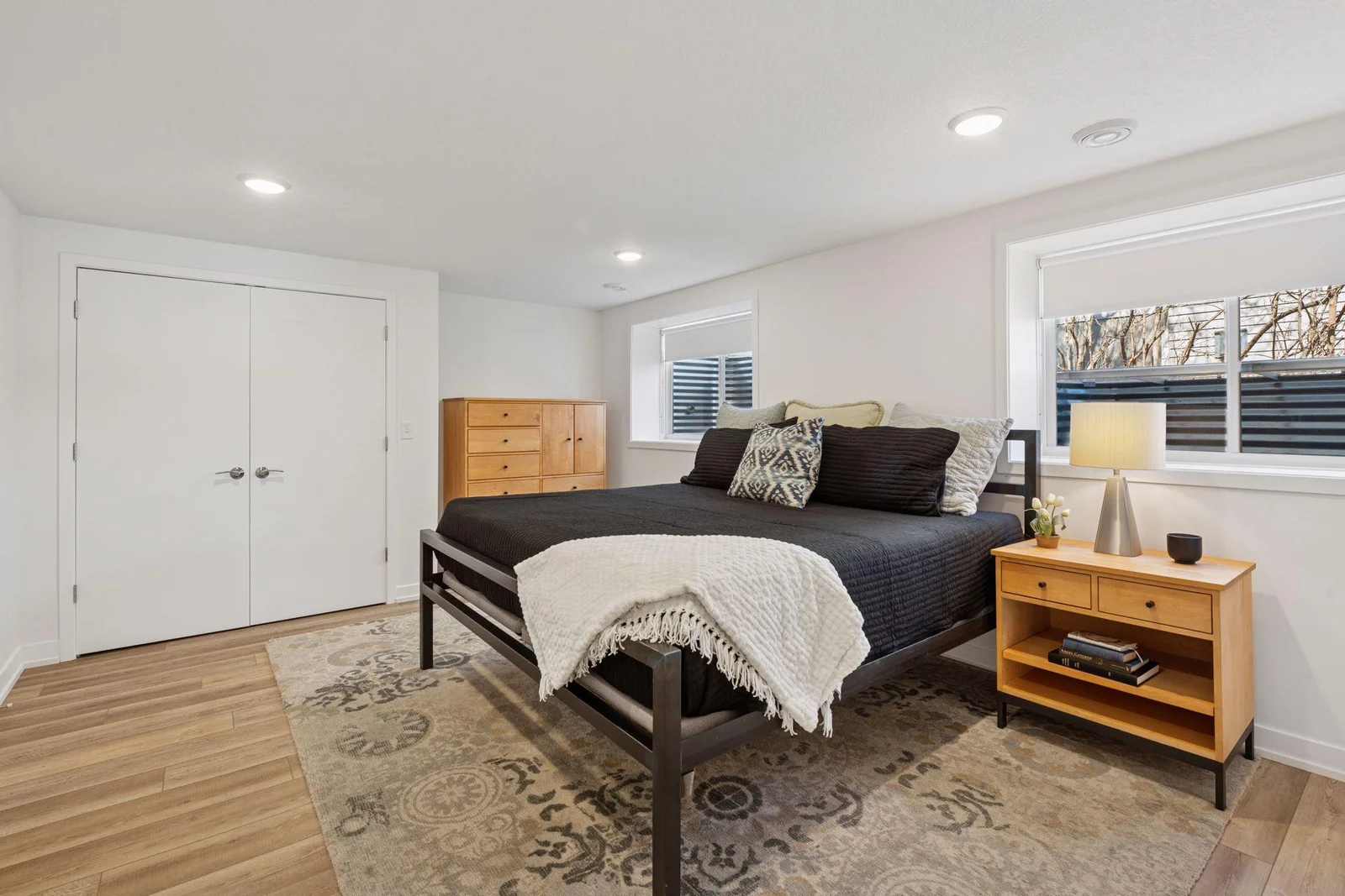 Head down to the lower level to discocer the large lakeside bedroom