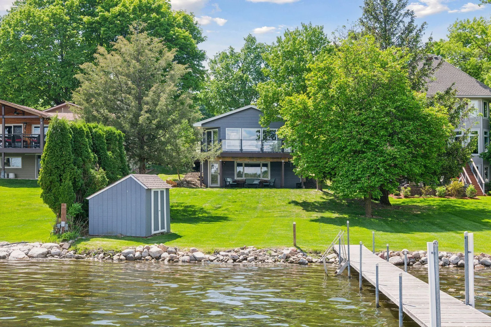 Enjoy a flat gently slopping lot to the shore