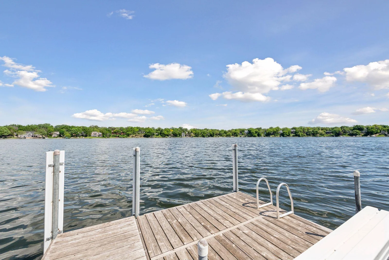 The bay is approximately 40 feet deep and known for its beautiful channel, which sets it apart from the hustle and bustle of the main lake