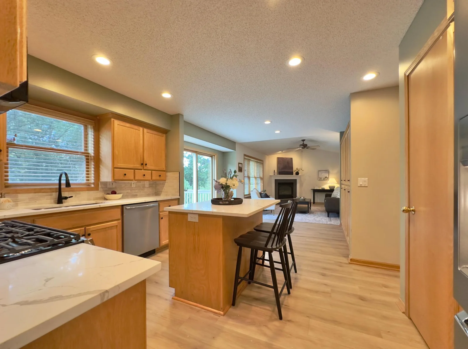 Another view of this space...luxury plank flooring with lifetime warranty throughout main level!