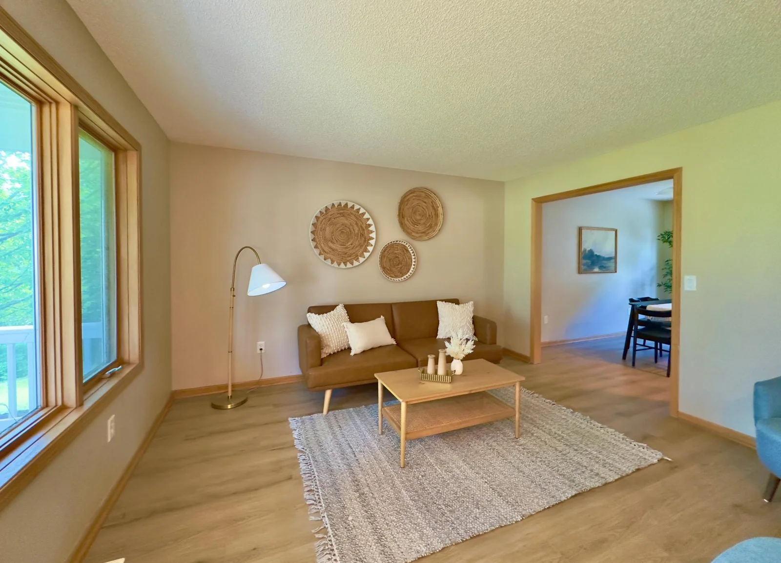 Bright and light filled living room greets you as you walk in!
