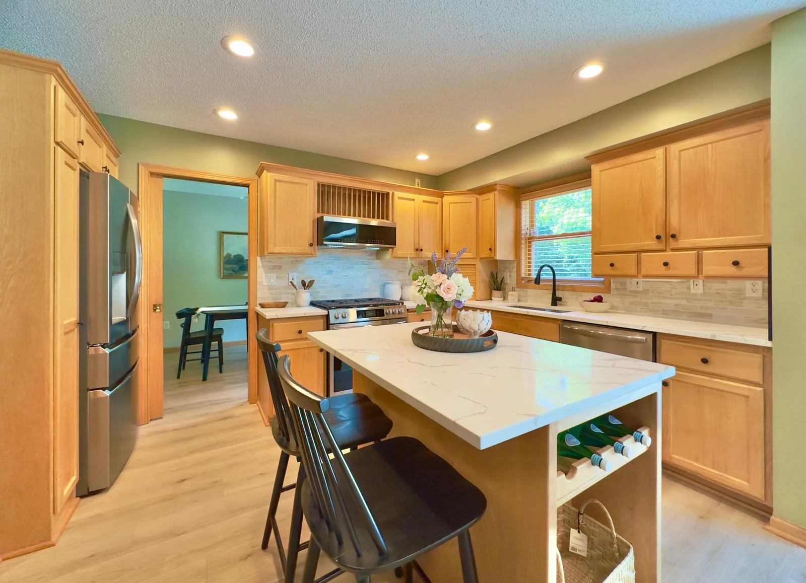 Center island offers seating and a great gathering space