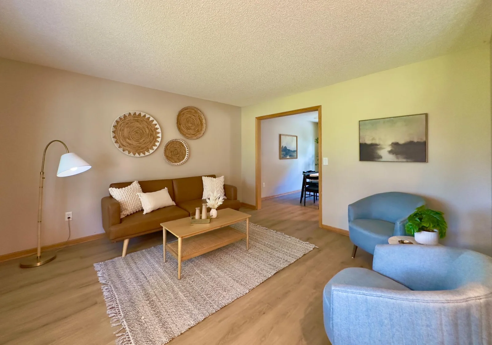 This shot shows the dining room sitting just off the living room
