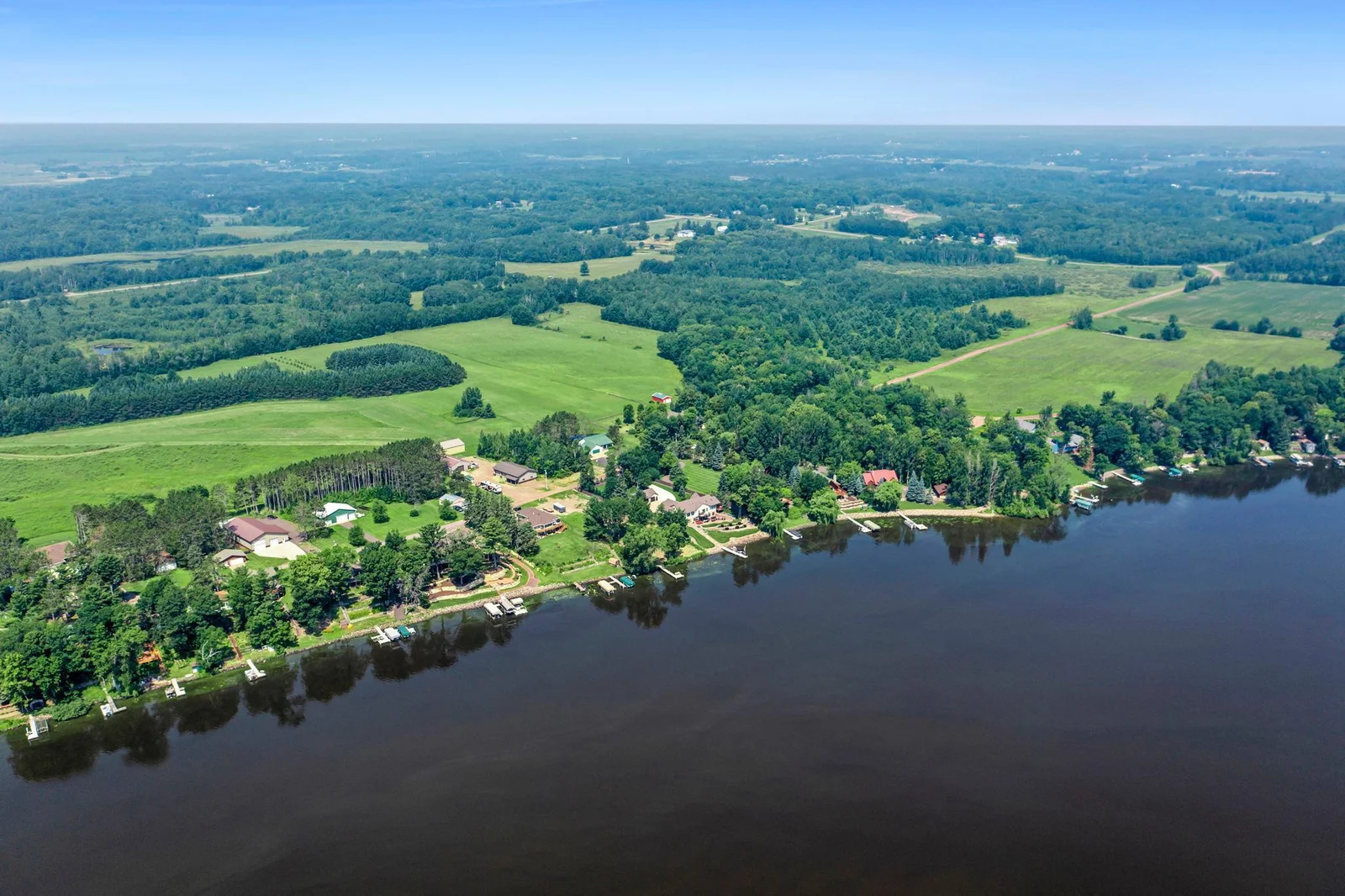 This custom built rambler has views of Cross Lake in Pine City.