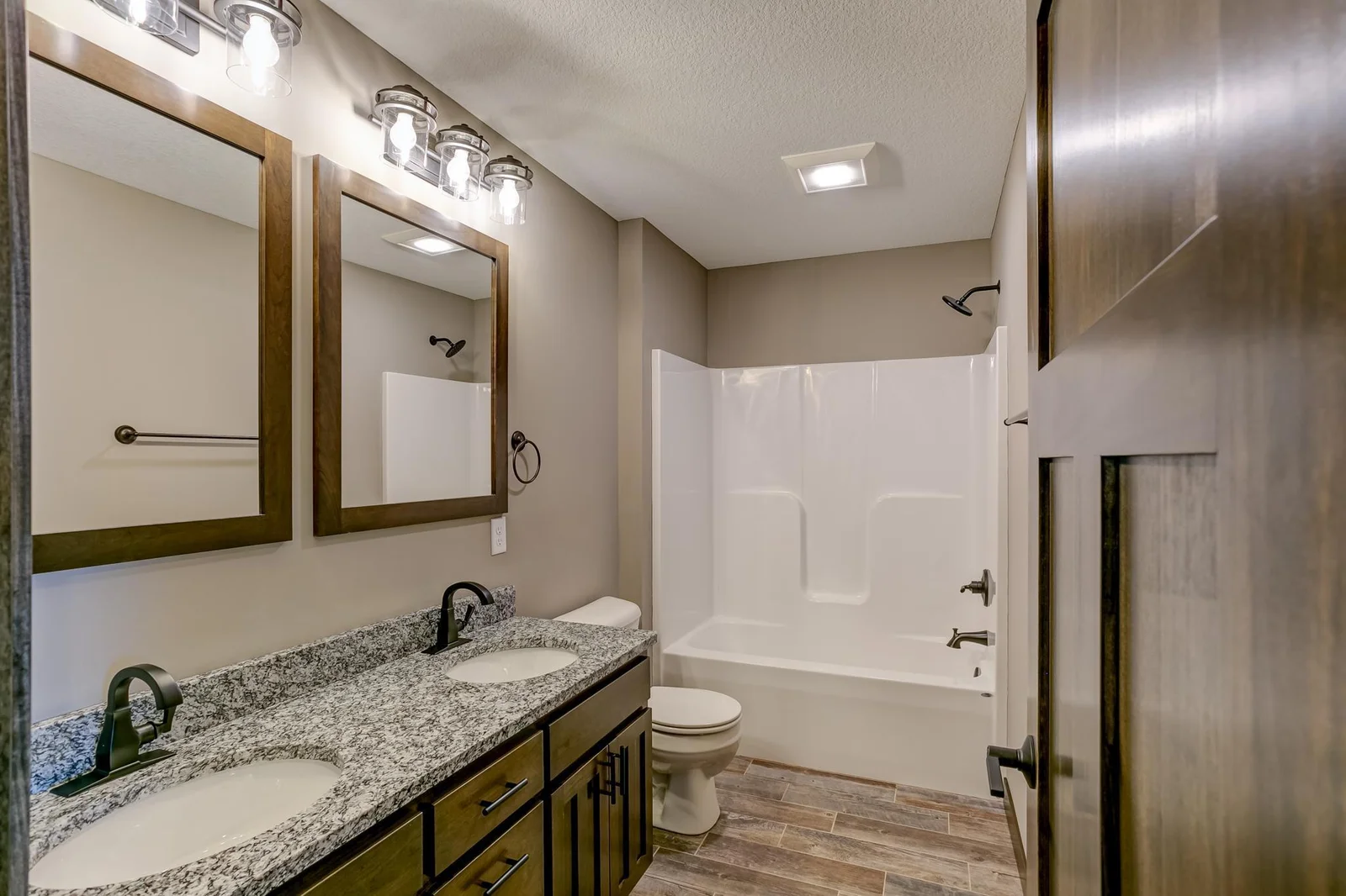 Photos are of a previously completed home with similar design and features. Actual selections, finishes, and materials may vary based on buyer choices and availability.