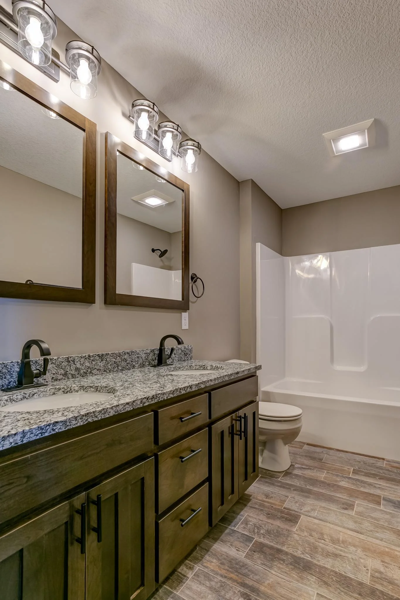 Photos are of a previously completed home with similar design and features. Actual selections, finishes, and materials may vary based on buyer choices and availability.