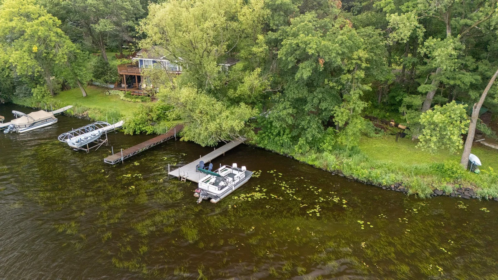 Deeded lake access and shared dock.