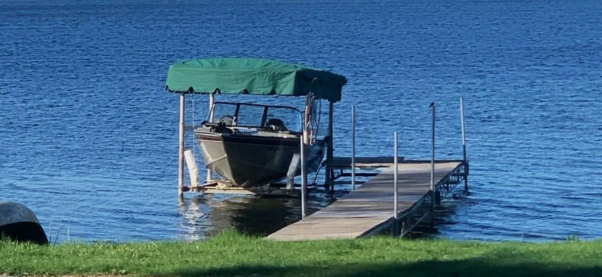 Boat and lift included