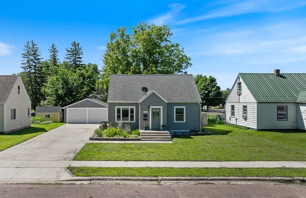 Impressive exterior updates include siding, Timberland HD shingles, concrete driveway, and new garage doors!